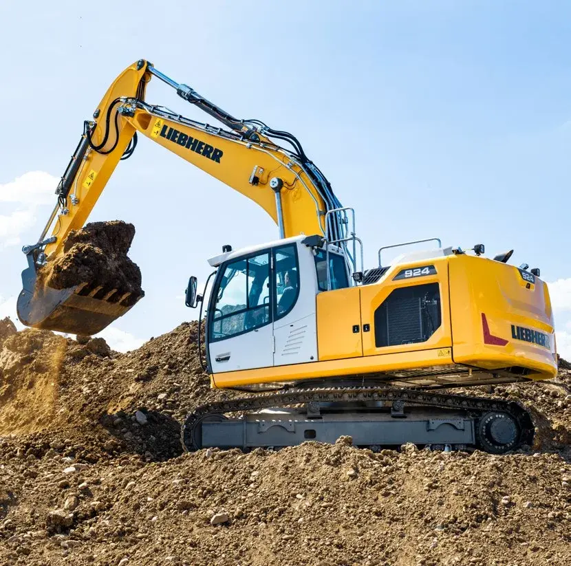 Pelle hydraulique Liebherr R 924 Litronic sur chenilles en action